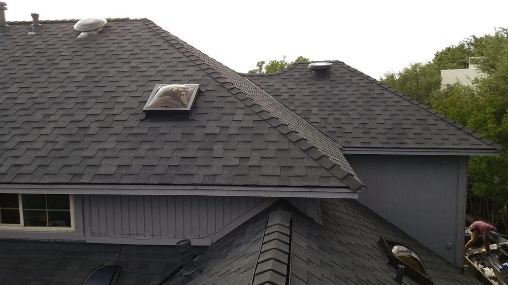 Slide of Cowtown Roofing