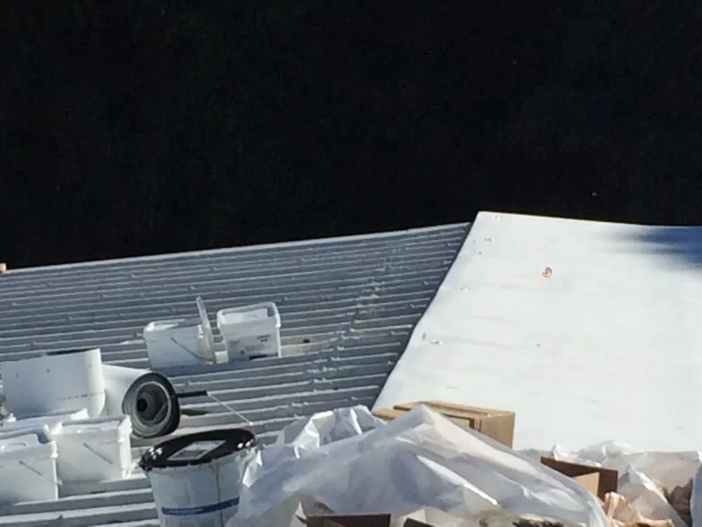 Slide of Cox Roofing