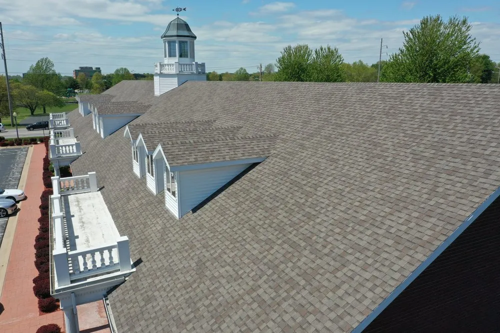 Professional flat roof repair experts serving Brookline, MO - Cox Roofing