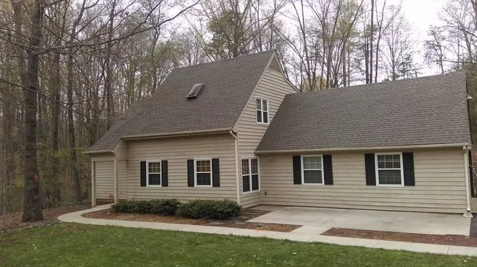 Slide of Cox Roofing