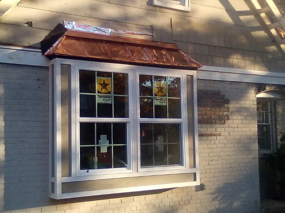 Slide of Cox Roofing