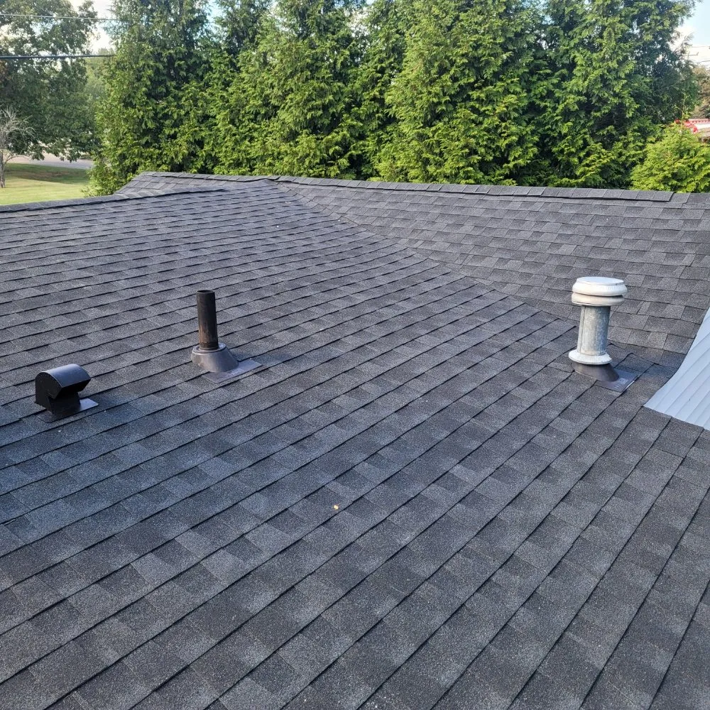 Slide of Cox Roofing