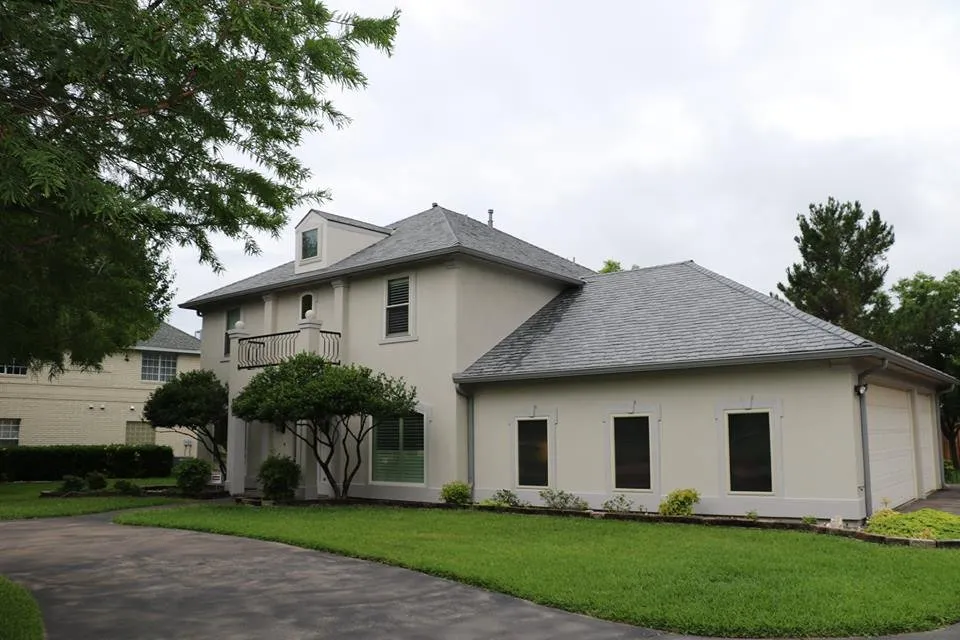 Slide of Coxco Roofing