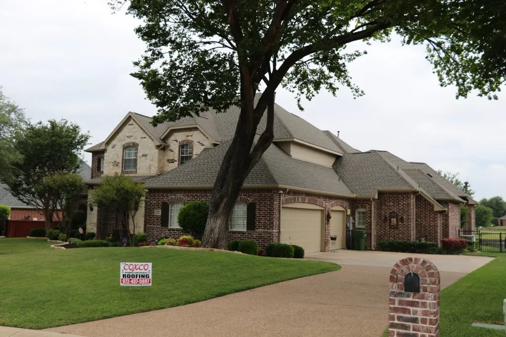 Slide of Coxco Roofing