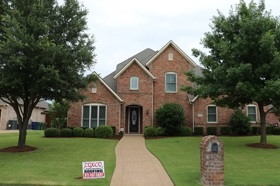 Slide of Coxco Roofing