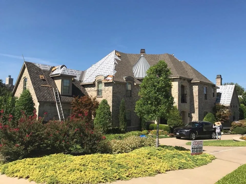 Slide of Coxco Roofing