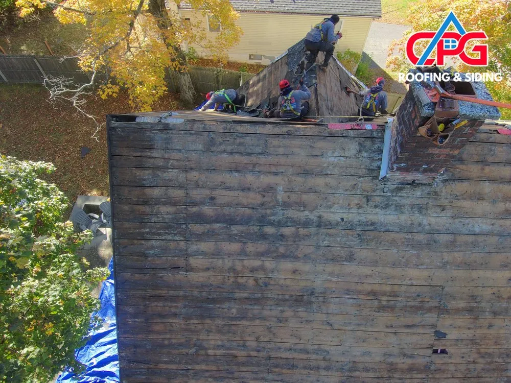 Slide of CPG Roofing & Siding