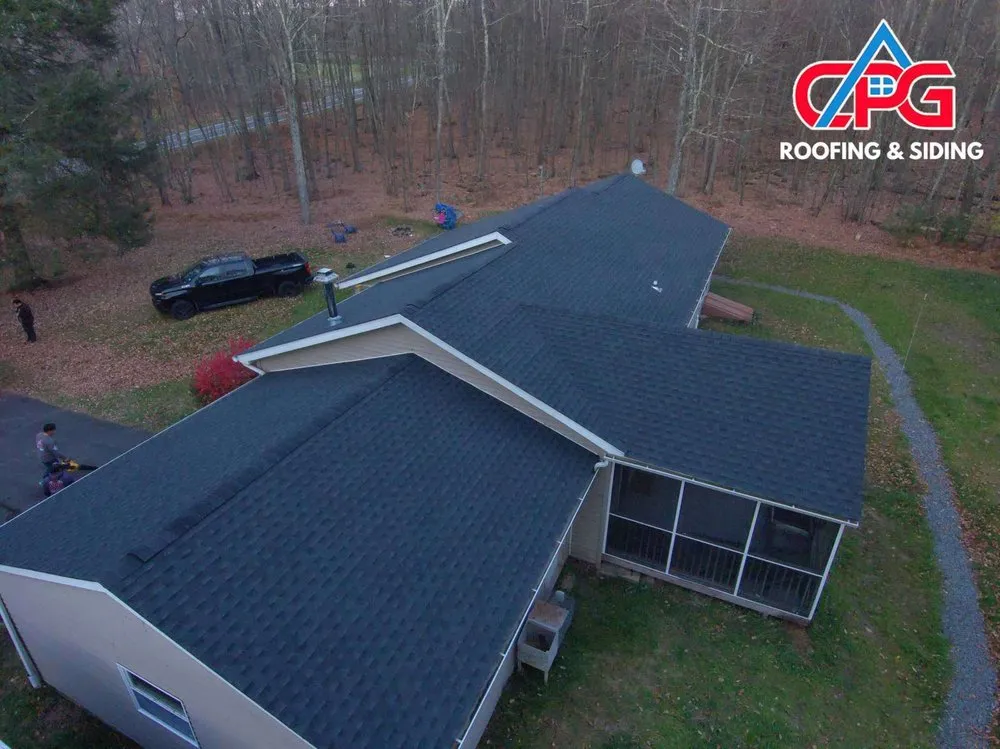 Slide of CPG Roofing & Siding