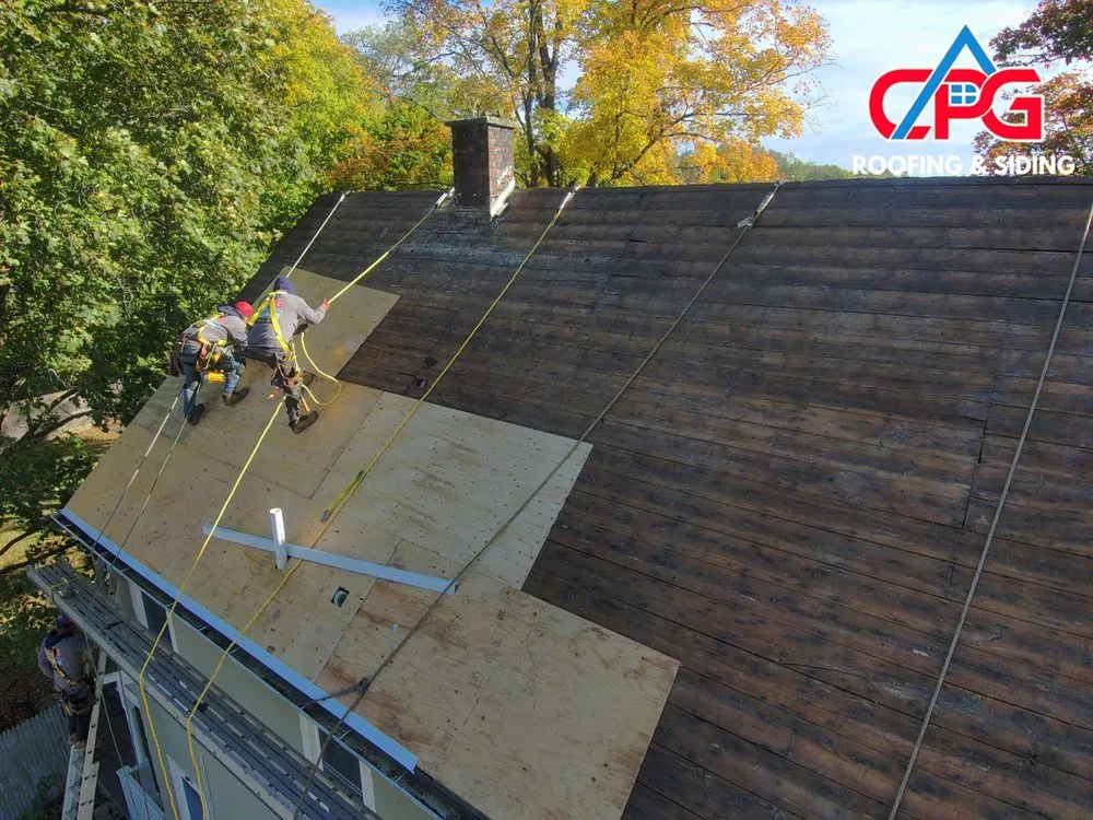 Slide of CPG Roofing & Siding