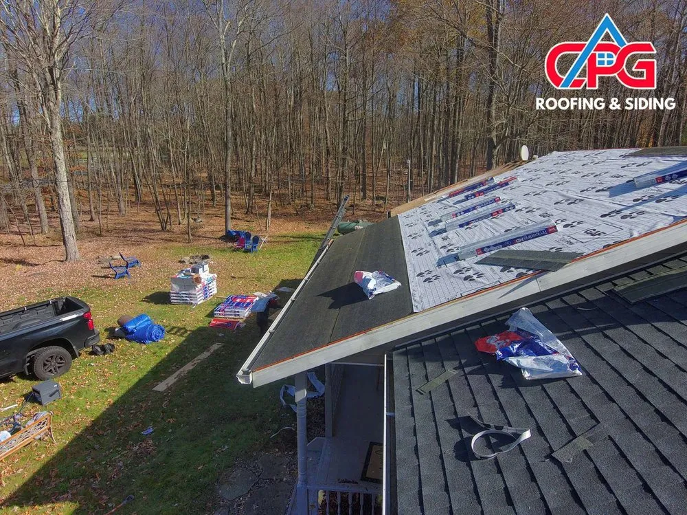Slide of CPG Roofing & Siding