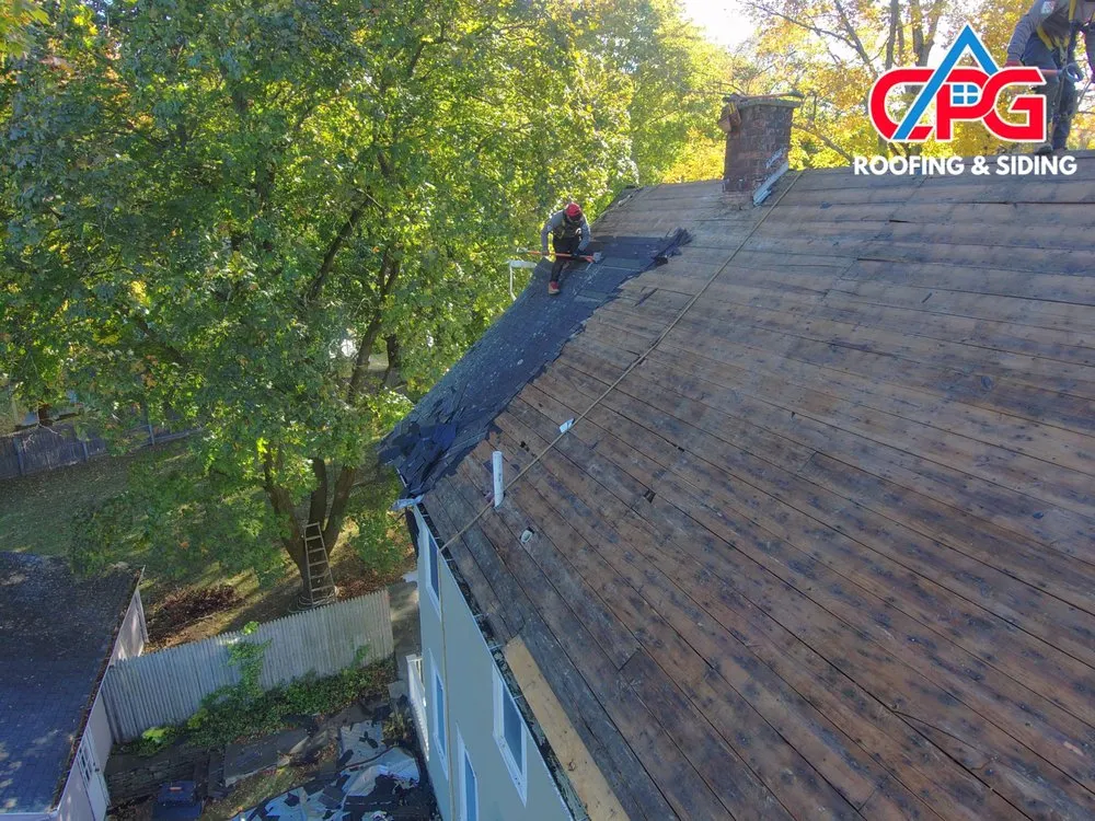 Slide of CPG Roofing & Siding