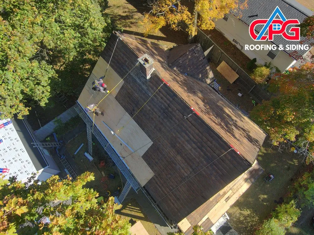 Slide of CPG Roofing & Siding