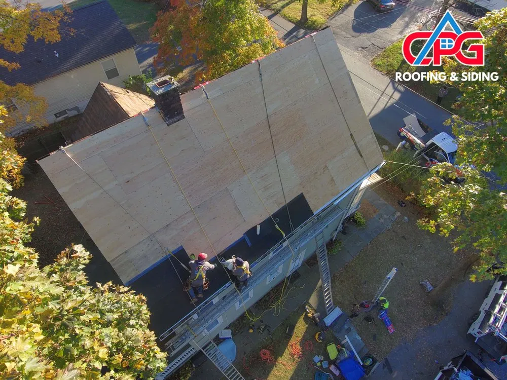 Slide of CPG Roofing & Siding