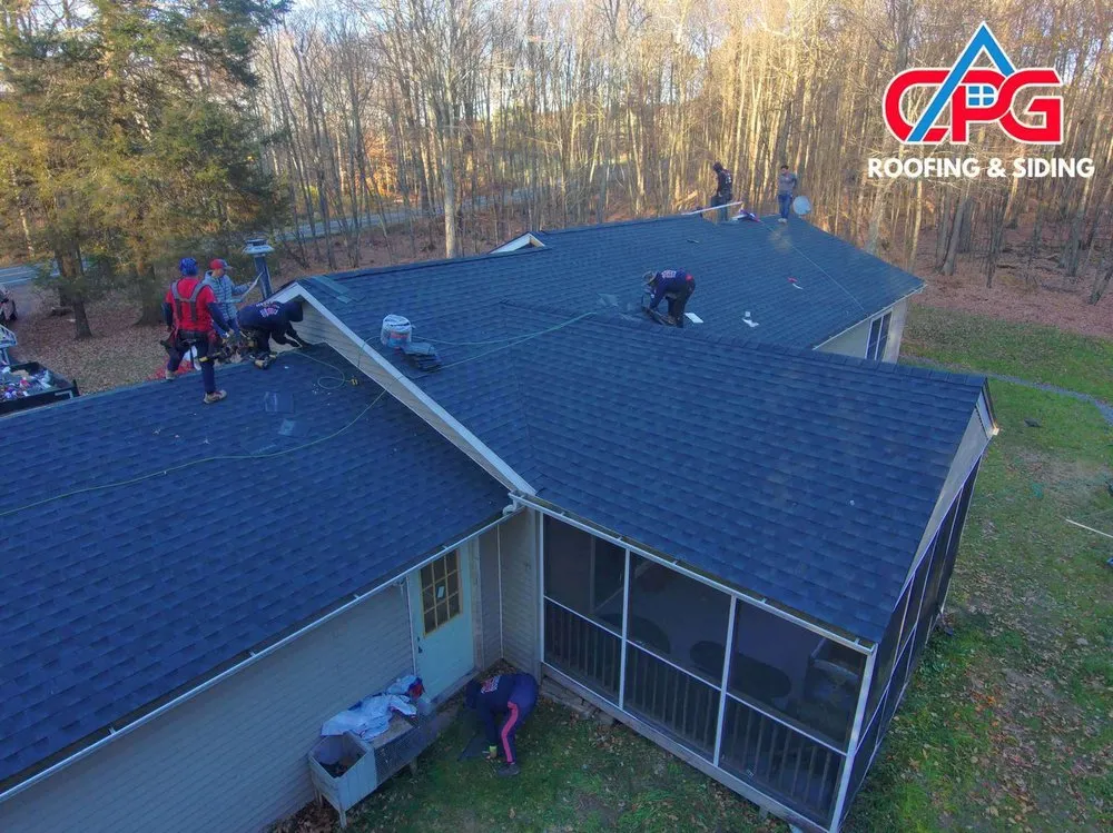 Slide of CPG Roofing & Siding