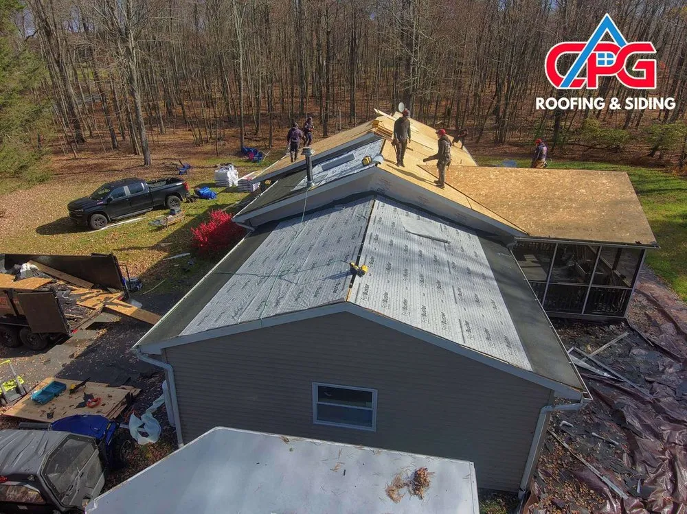 Slide of CPG Roofing & Siding
