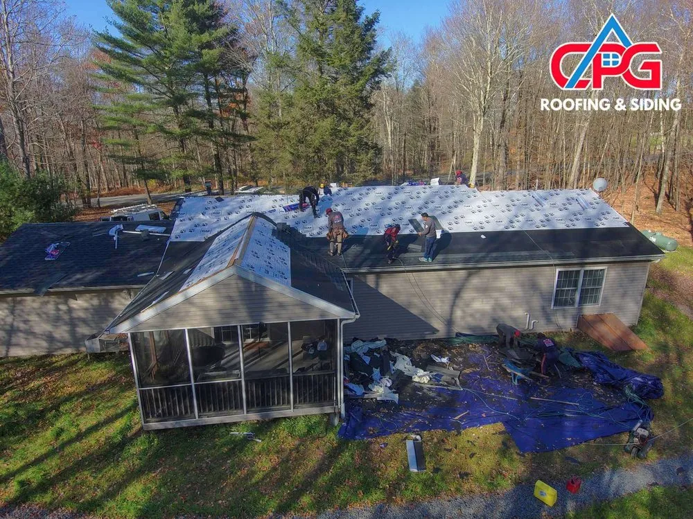 Slide of CPG Roofing & Siding