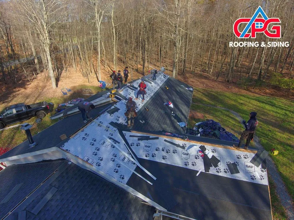 Slide of CPG Roofing & Siding