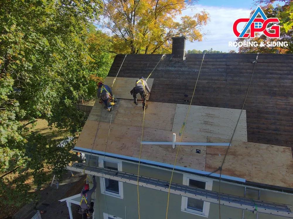 Slide of CPG Roofing & Siding