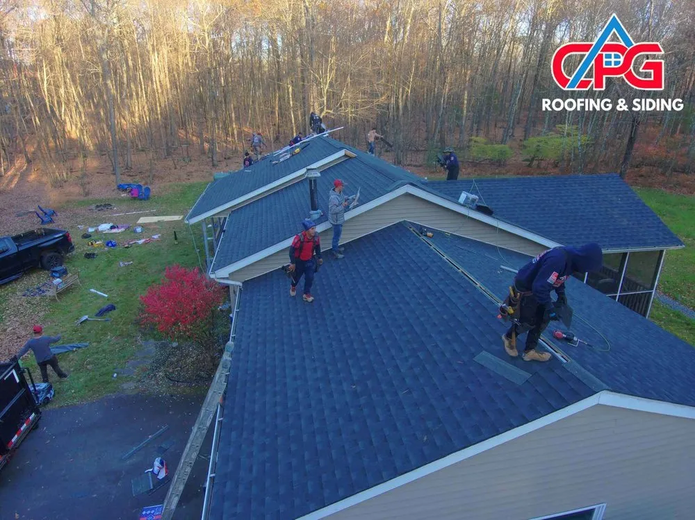 Slide of CPG Roofing & Siding