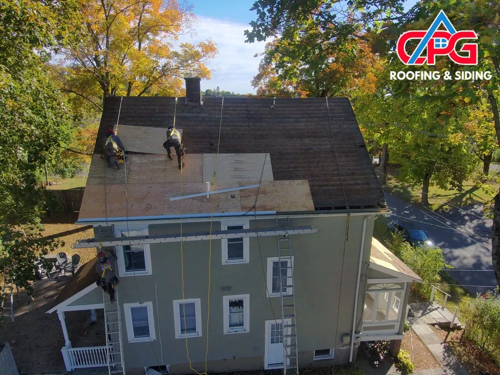 Slide of CPG Roofing & Siding