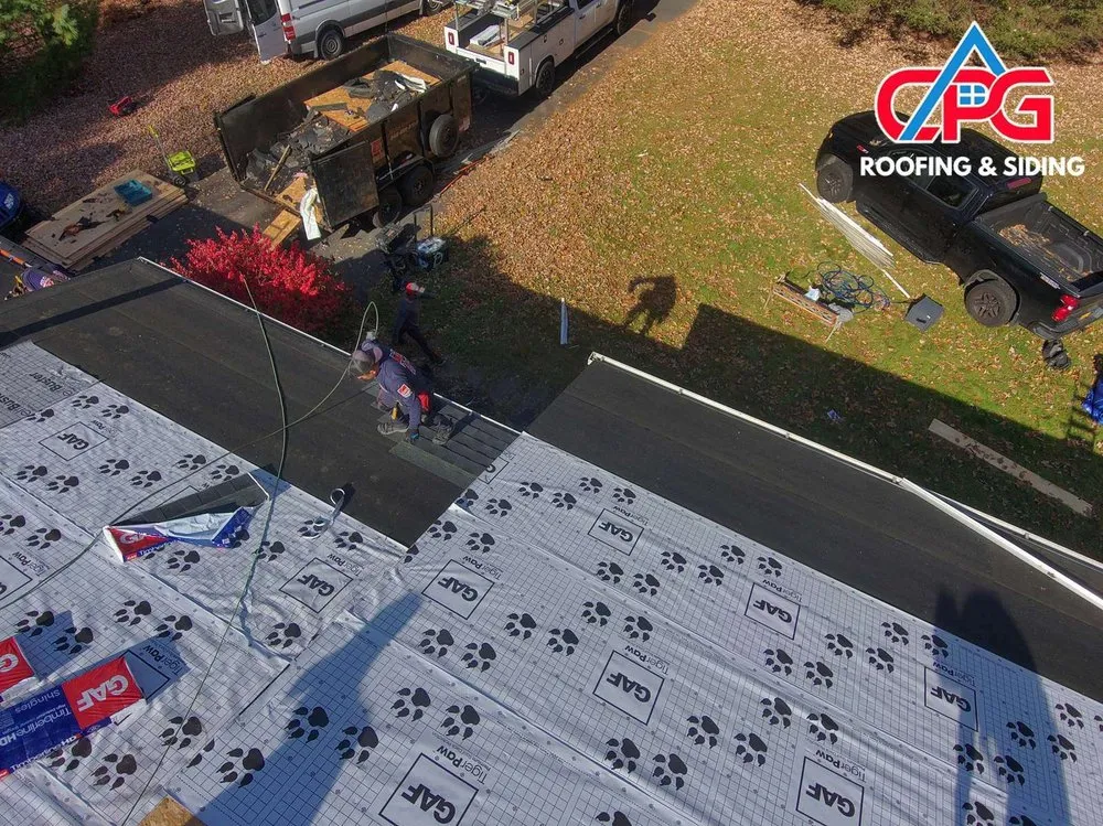 Slide of CPG Roofing & Siding