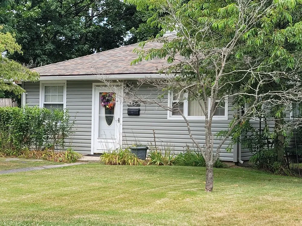 Slide of Craftsman Roofing and Masonry