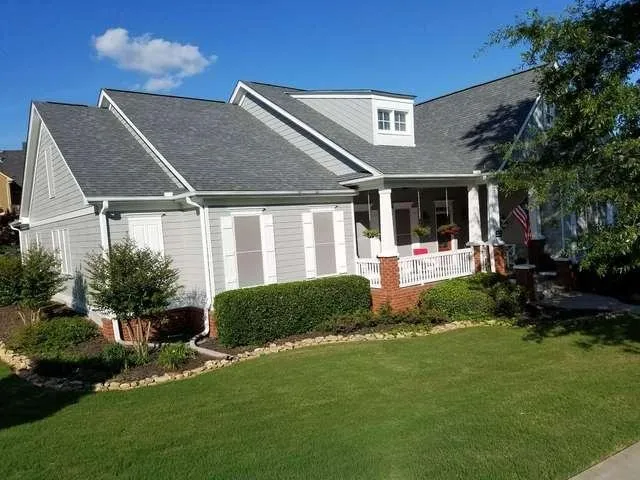 Slide of Craftsman Roofing and Restoration