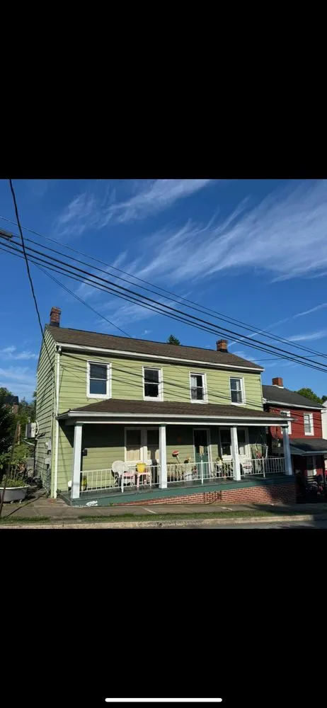 Slide of Craftsman Roofing Group