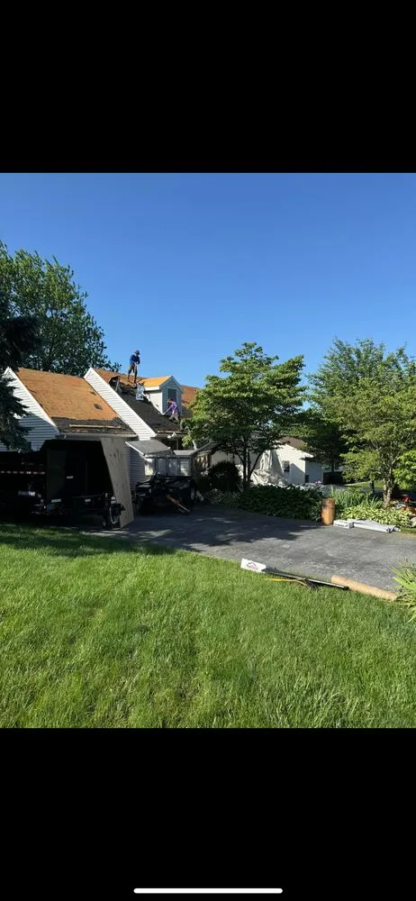 Slide of Craftsman Roofing Group