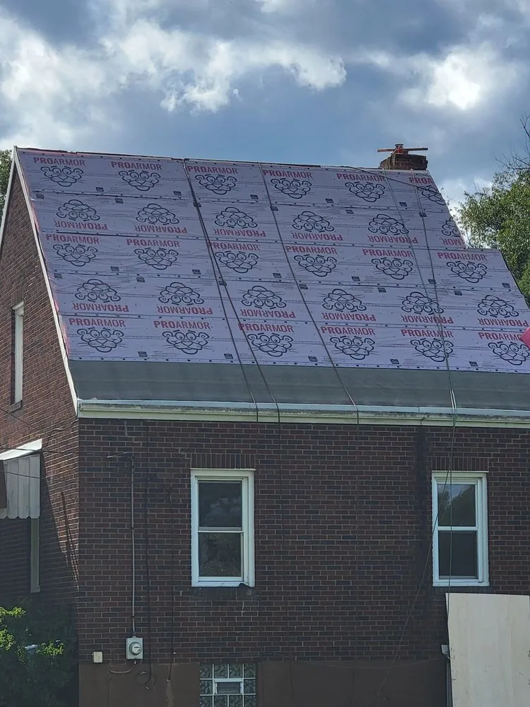 Slide of Craig Gouker Roofing