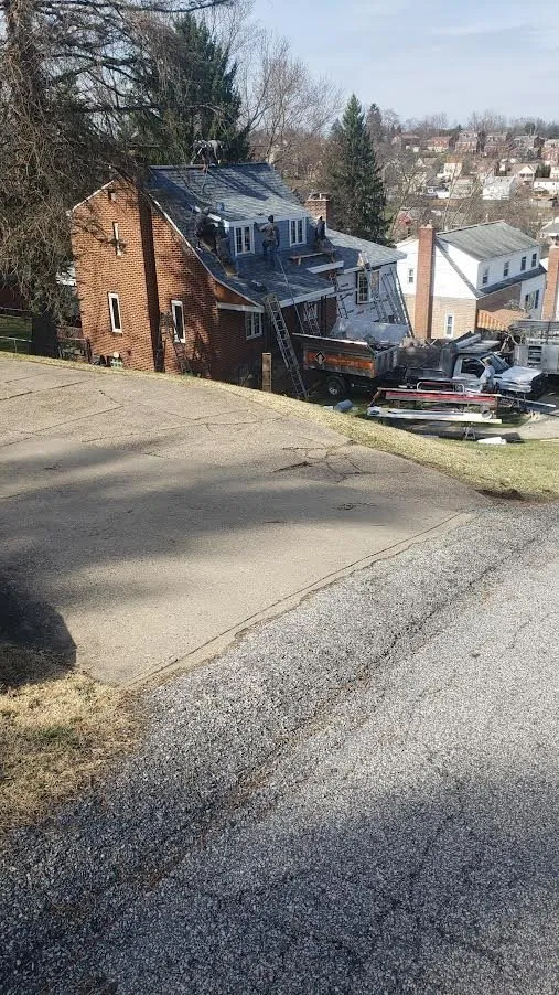 Slide of Craig Gouker Roofing