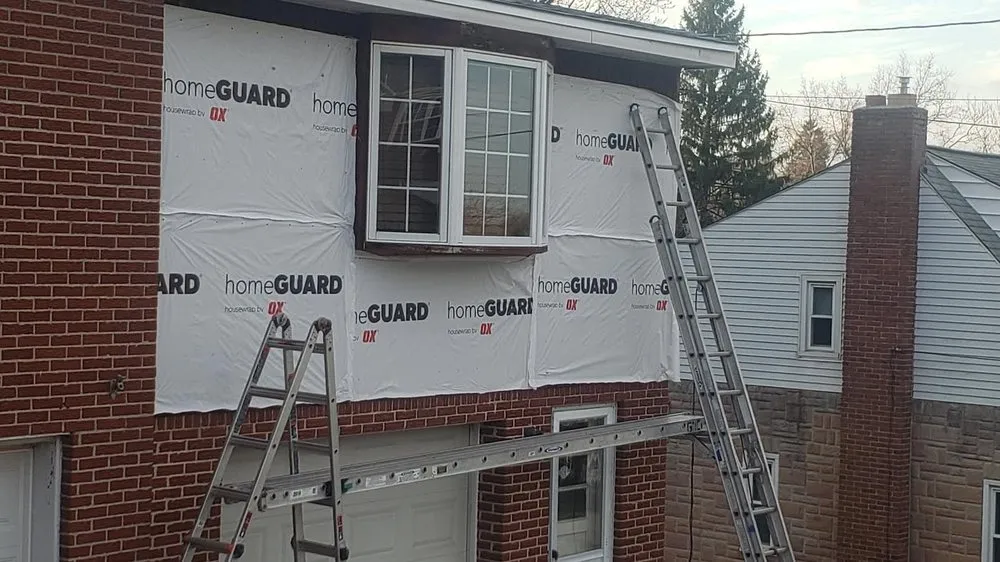 Slide of Craig Gouker Roofing