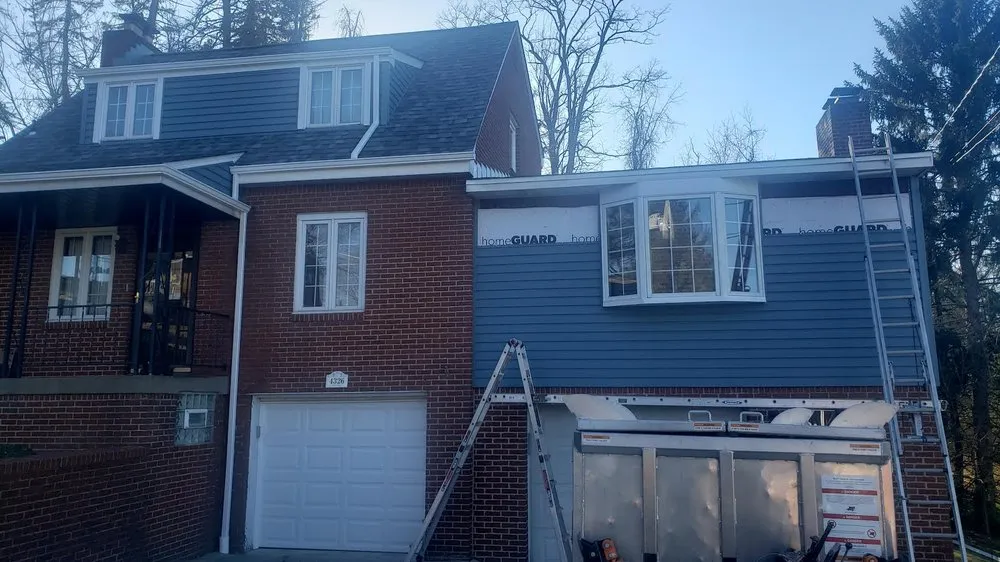 Slide of Craig Gouker Roofing