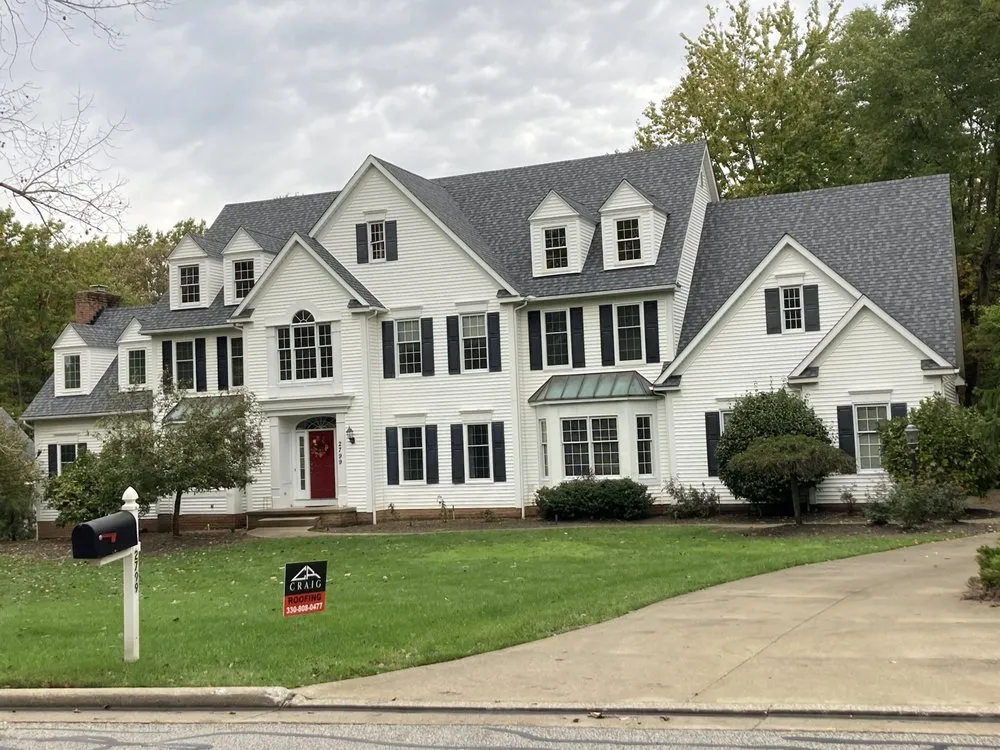 Slide of Craig Roofing