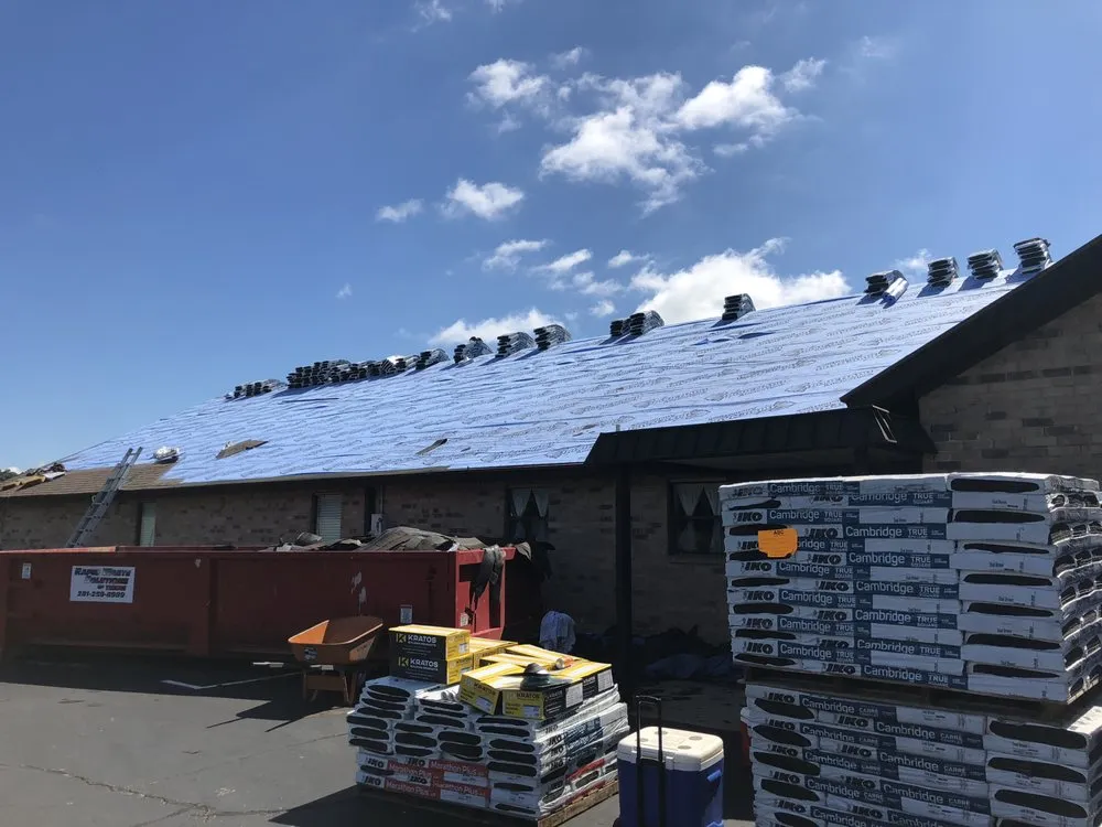 Slide of C.R.E Roofing & Restoration