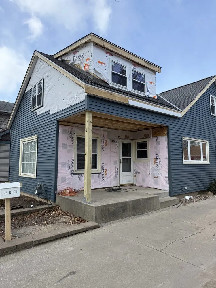 Slide of Cream City Roofing & Siding