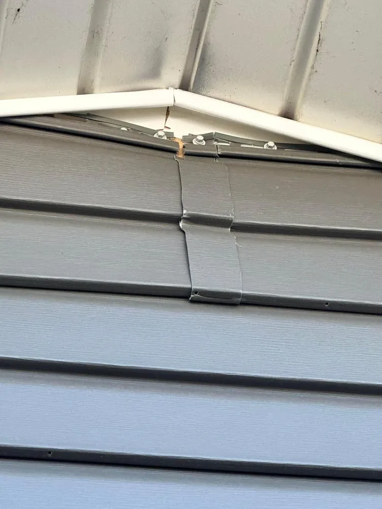 Professional roof inspection after storm damage in New Hampshire, OH by Creative Concrete and Construction