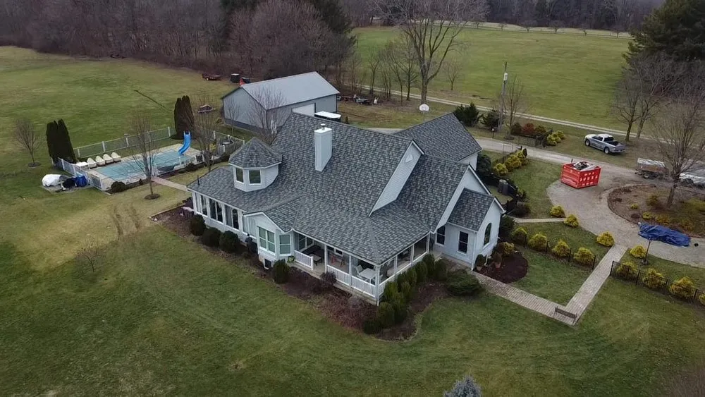 Local roof replacement after storm damage in Dundee, OH by Creekside Roofing & Decks