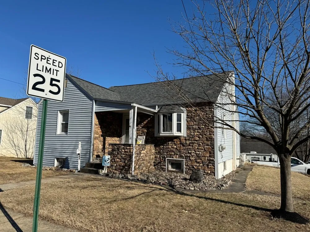 Slide of Crooked Ladder Roofing