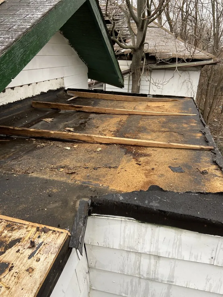 Slide of Cross Roofing & Masonry