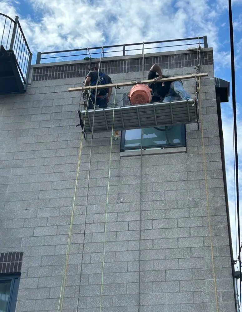Slide of Cross Roofing & Masonry
