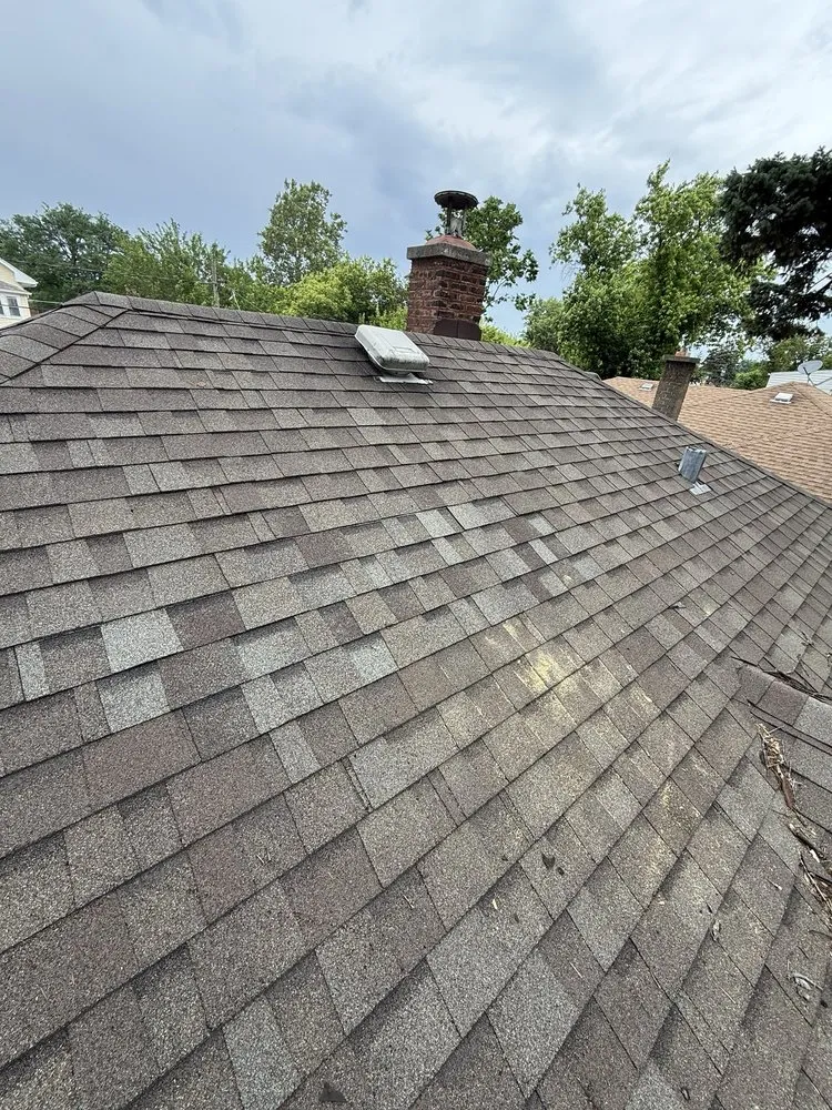 Slide of Cross Roofing & Masonry