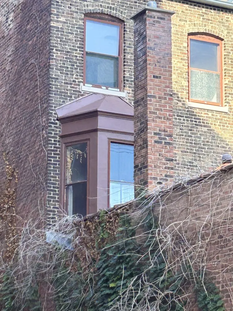 Slide of Cross Roofing & Masonry