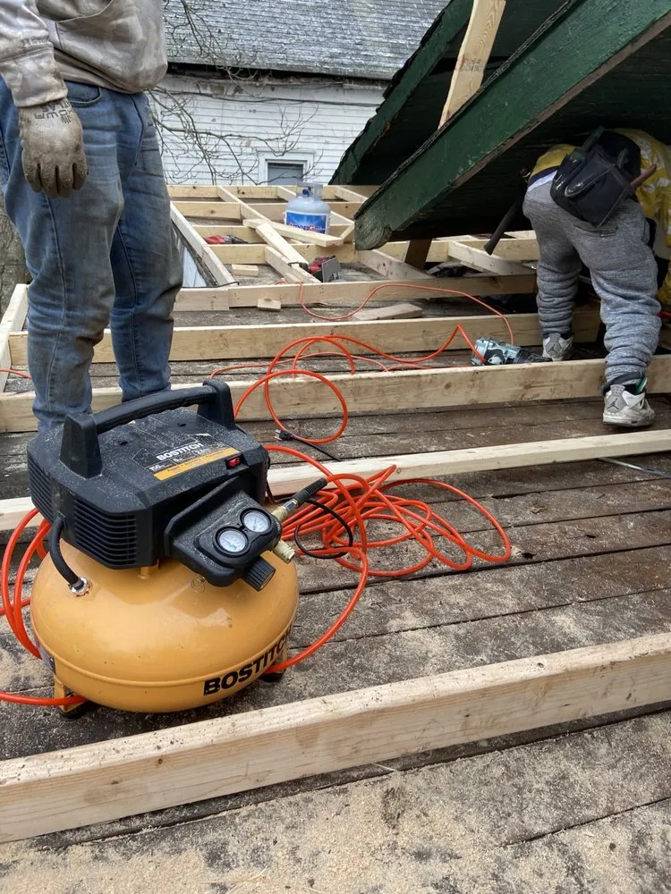 Slide of Cross Roofing & Masonry