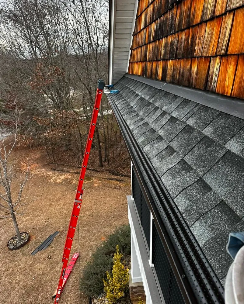 Slide of Crown City Gutters