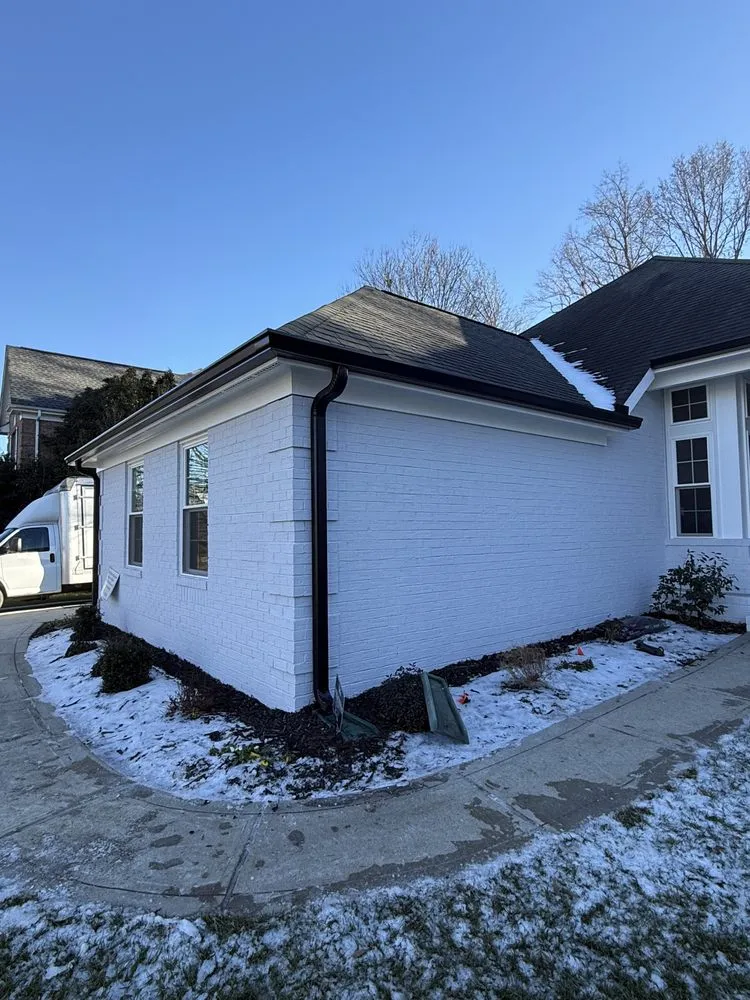 Slide of Crown City Gutters