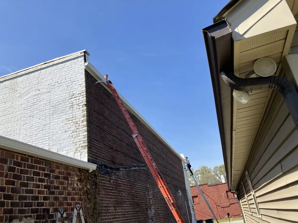 Slide of Crown City Gutters