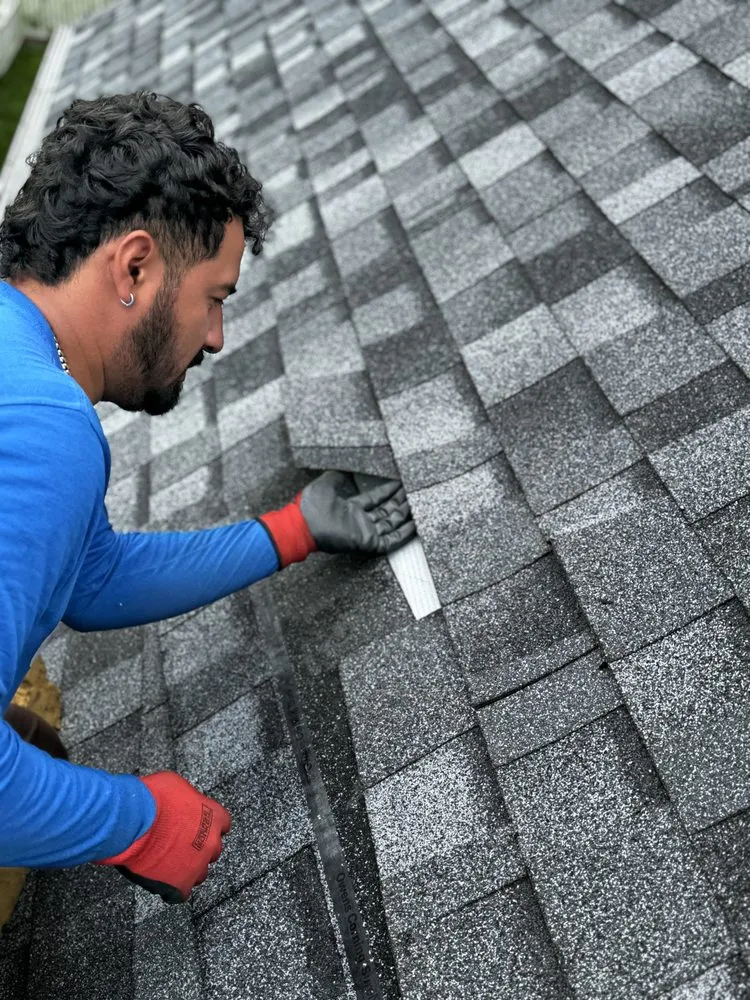 Slide of Crows Roofing
