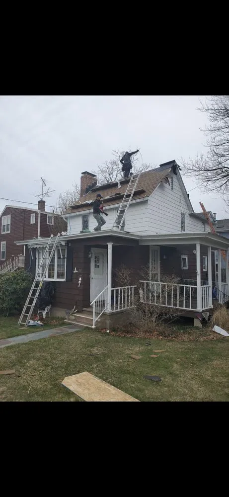 Slide of CT Roofing Services