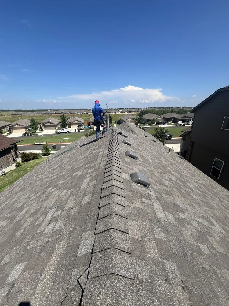 Slide of Cuellar Roofing and Solar